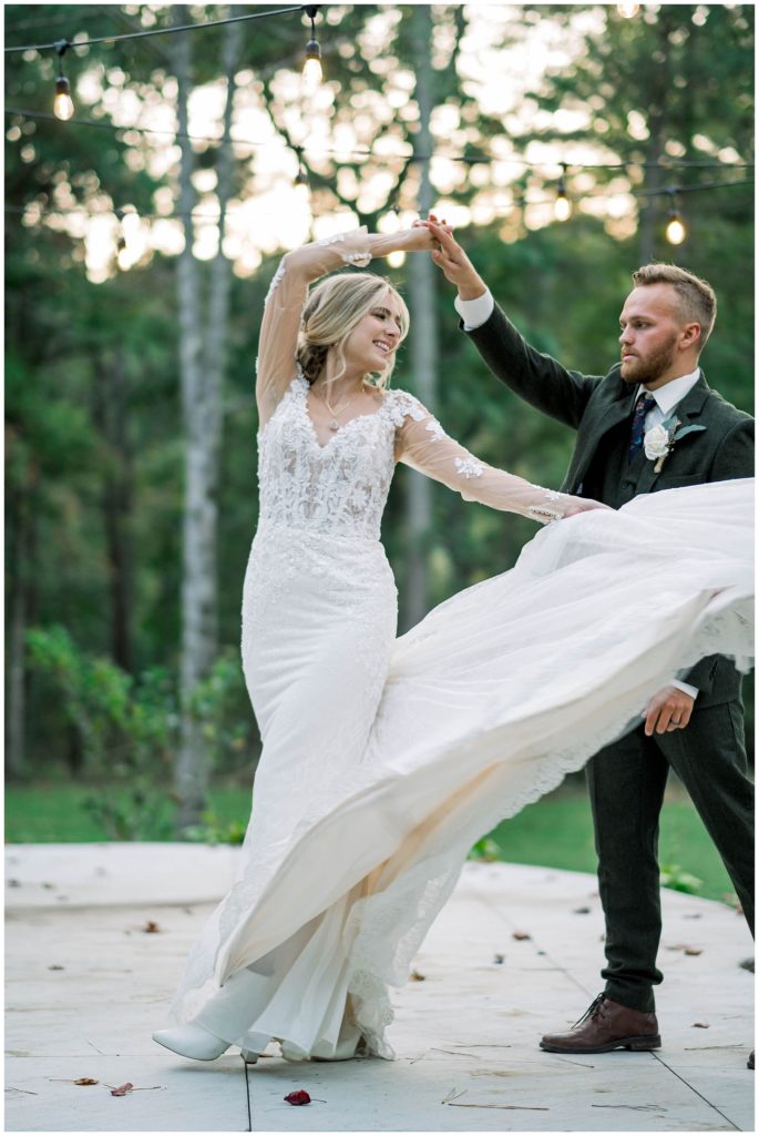 Bride and groom dancing together as husband and wife after hidden springs wedding ceremony