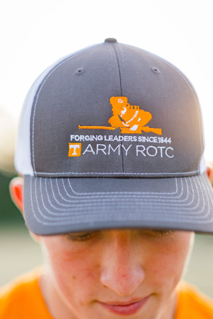 Young man wearing army ROTC hat