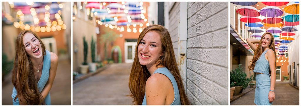 girl taking senior pictures in umbrella alley in chattanooga tennessee