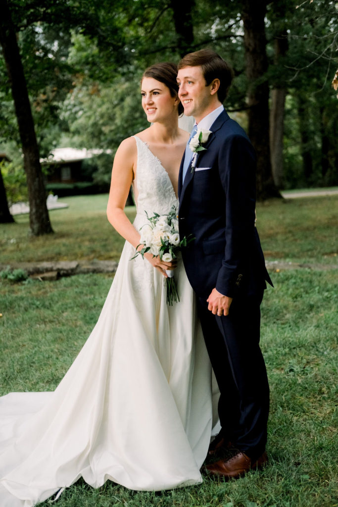 bride and groom posing during bridals in outdoor signal mountain micro wedding