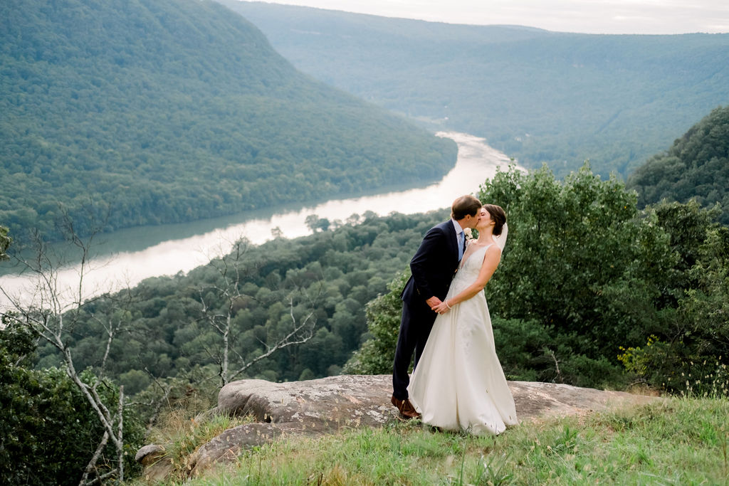 bride and groom kissing after recent signal mountain micro wedding 