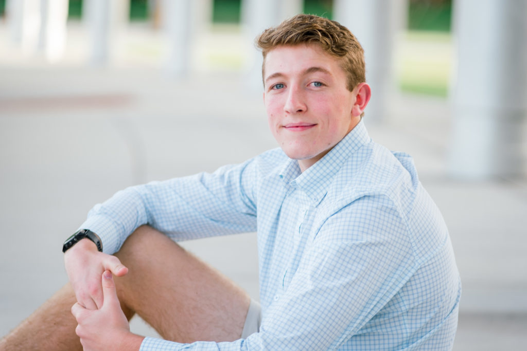 Knoxville senior wearing blue button down during senior session