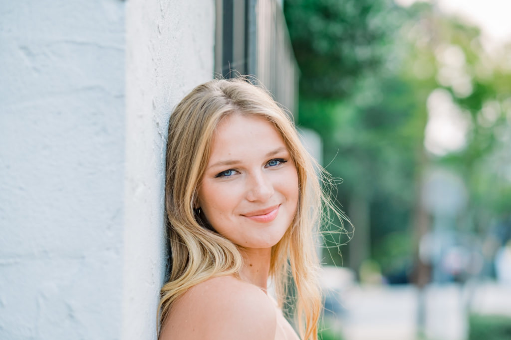 Young Chattanooga senior smiling during downtown senior session