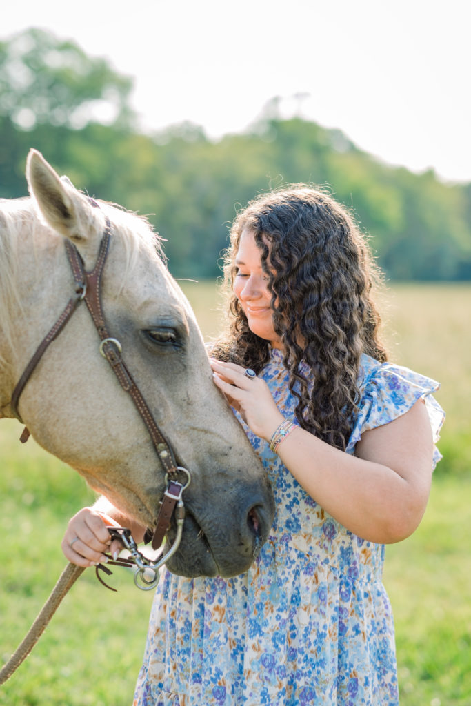 woman petting gray horse during Chickamauga Battlefield Outdoor Session 