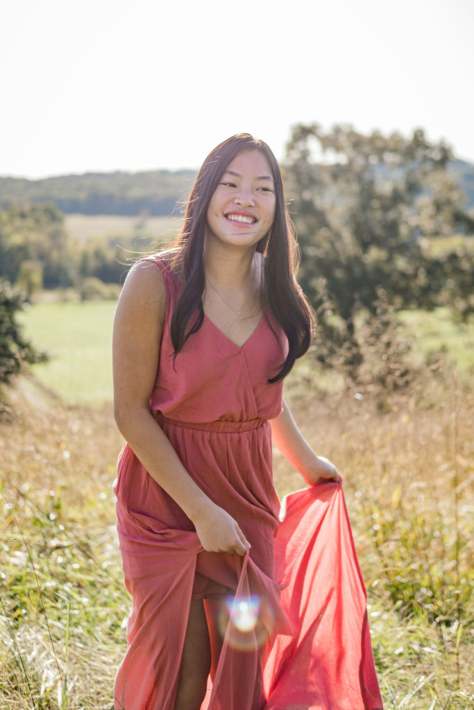 Tennessee senior wearing senior pictures dresses during outdoor spring senior session